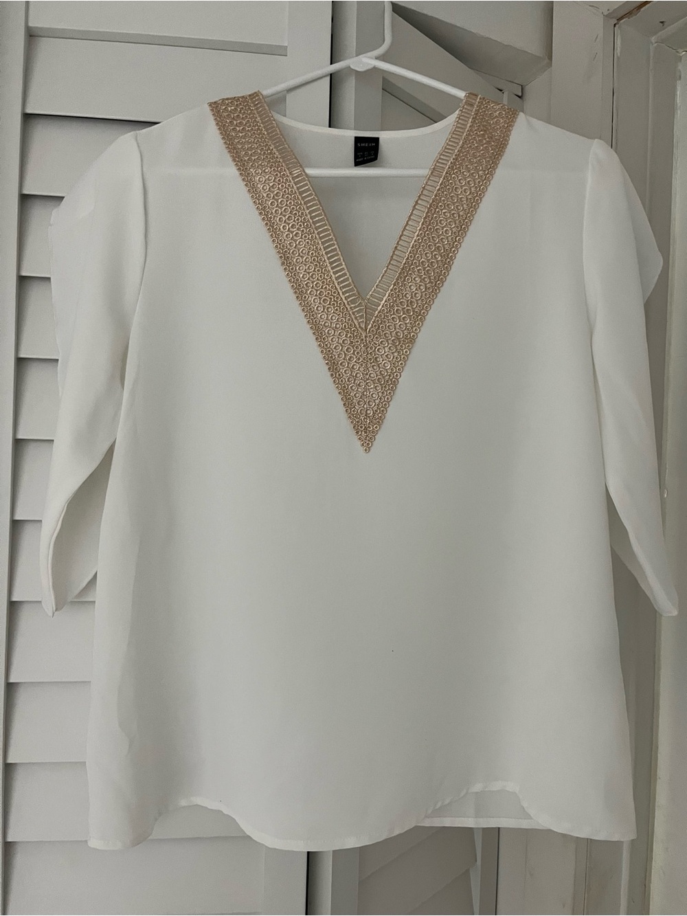 White Blouse with Gold Trim V-Neck